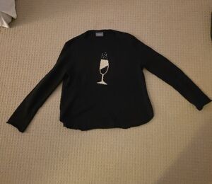 Wooden Ships Black Sweater with champagne glass